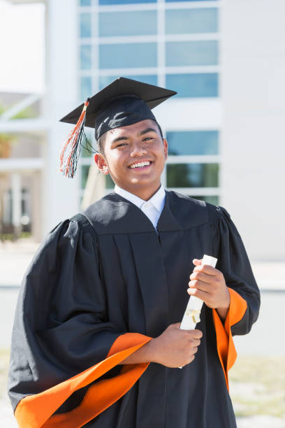 Young Man Graduating From High School Or University Stock Photo - Download  Image Now - Istock