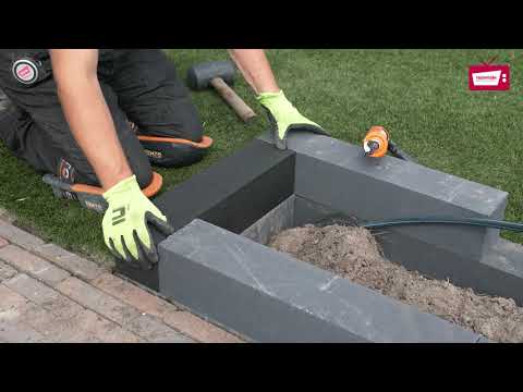 Aanleggen van een Wallblocks Plantenbak met Cortenstaal Overzetranden | TuinVisie Aanleggen van een Wallblocks Plantenbak met Cortenstaal Overzetranden | TuinVisie